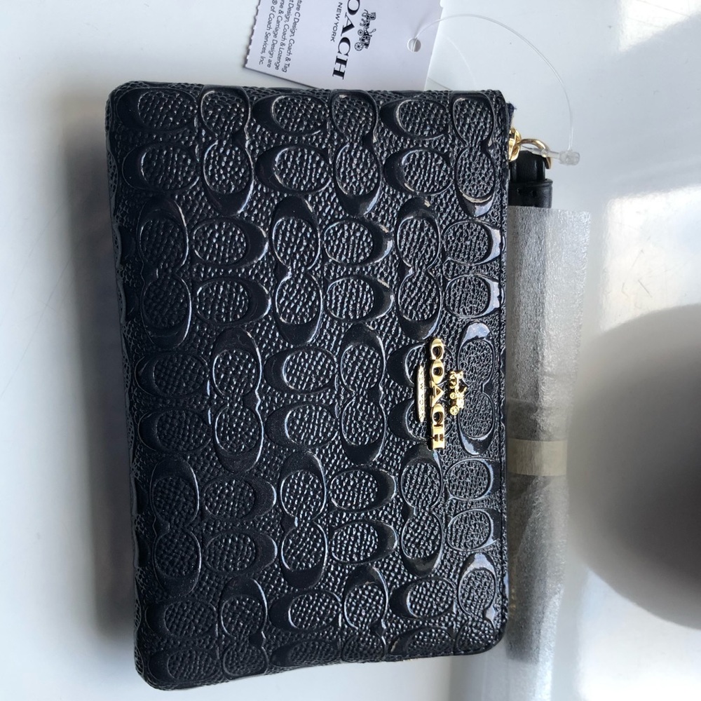 Navy coach wristlet